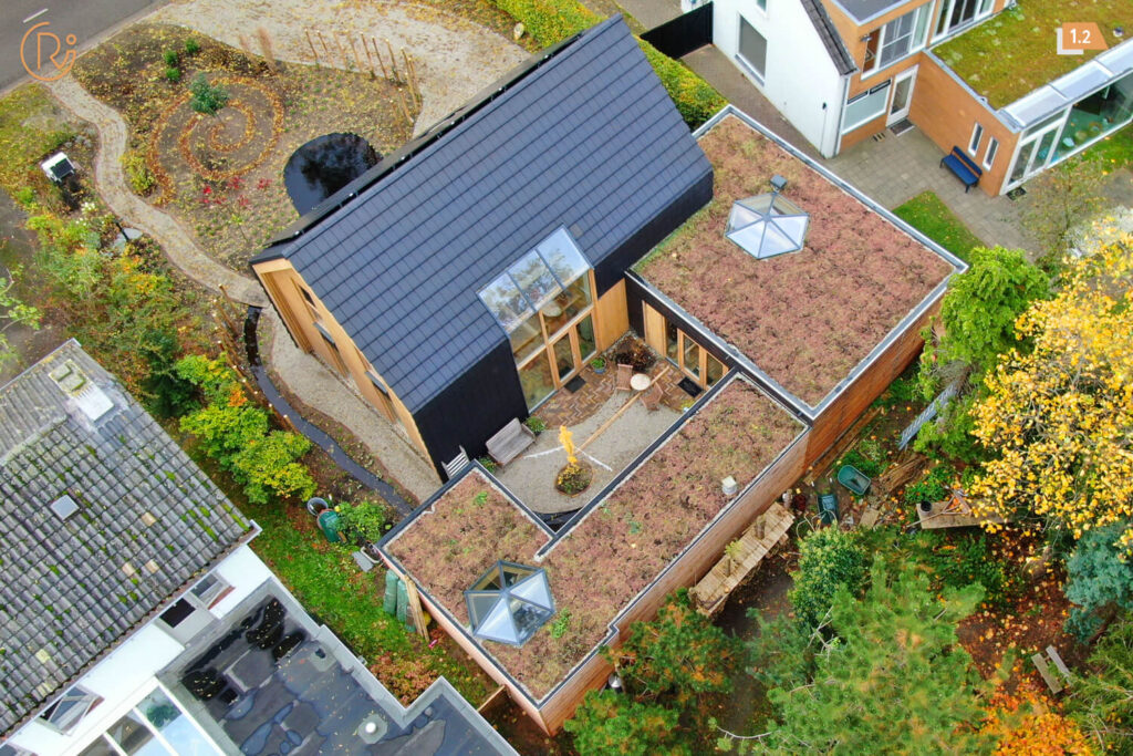 Gevelbekleding ecologische woning Den Dungen met populierenhout van Peppelhout
